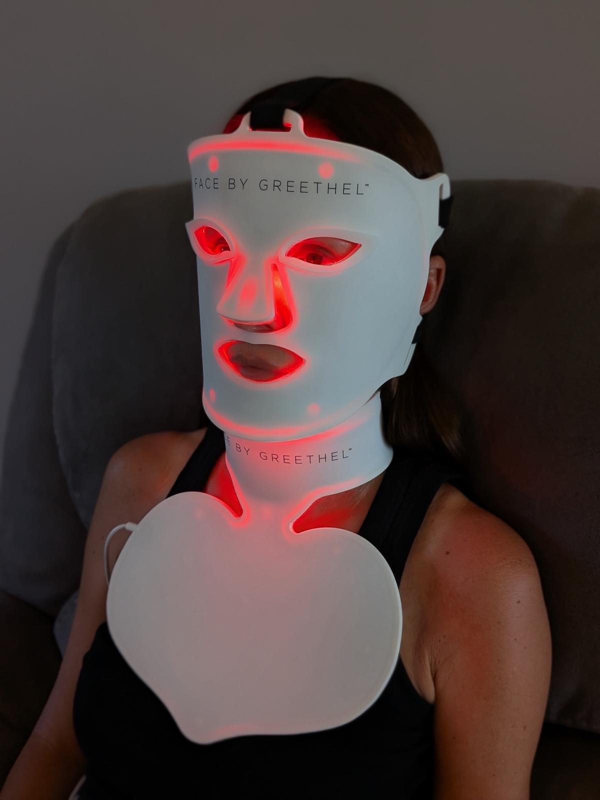 greethel wearing the LED Neck & Decolletage Mask