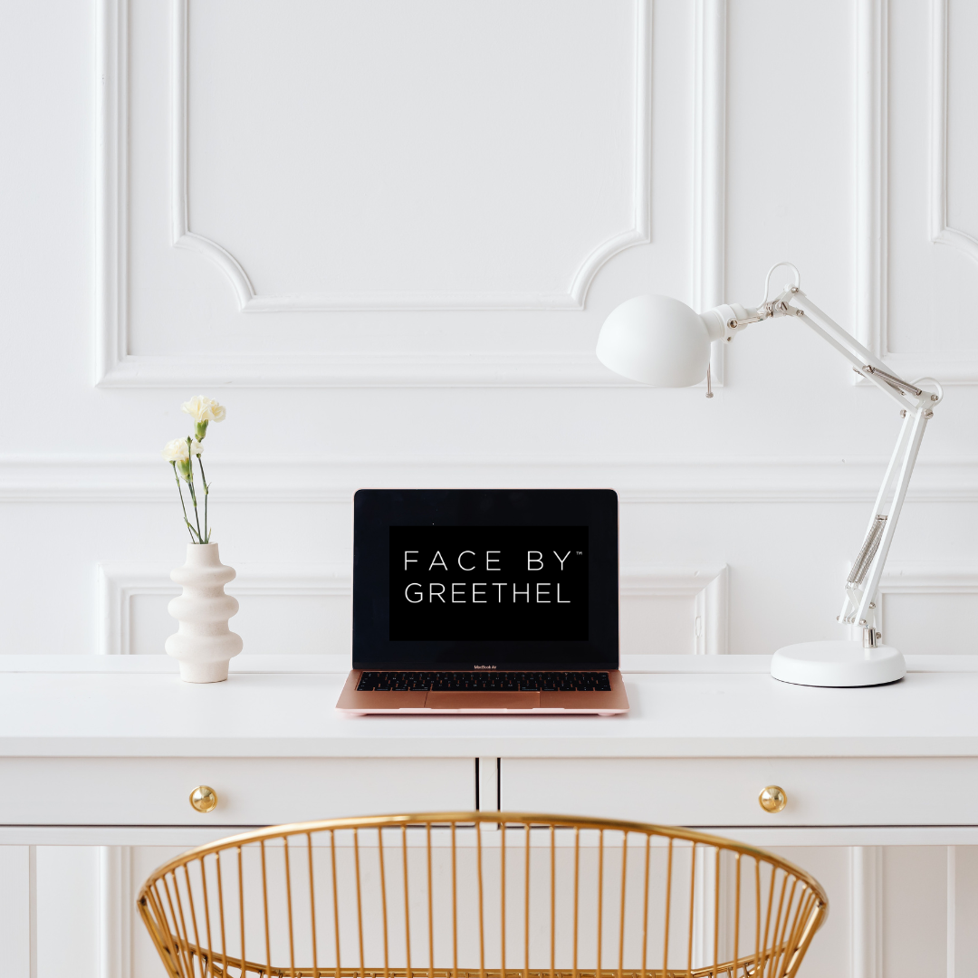 FACE by GREETHEL logo displayed on a laptop screen