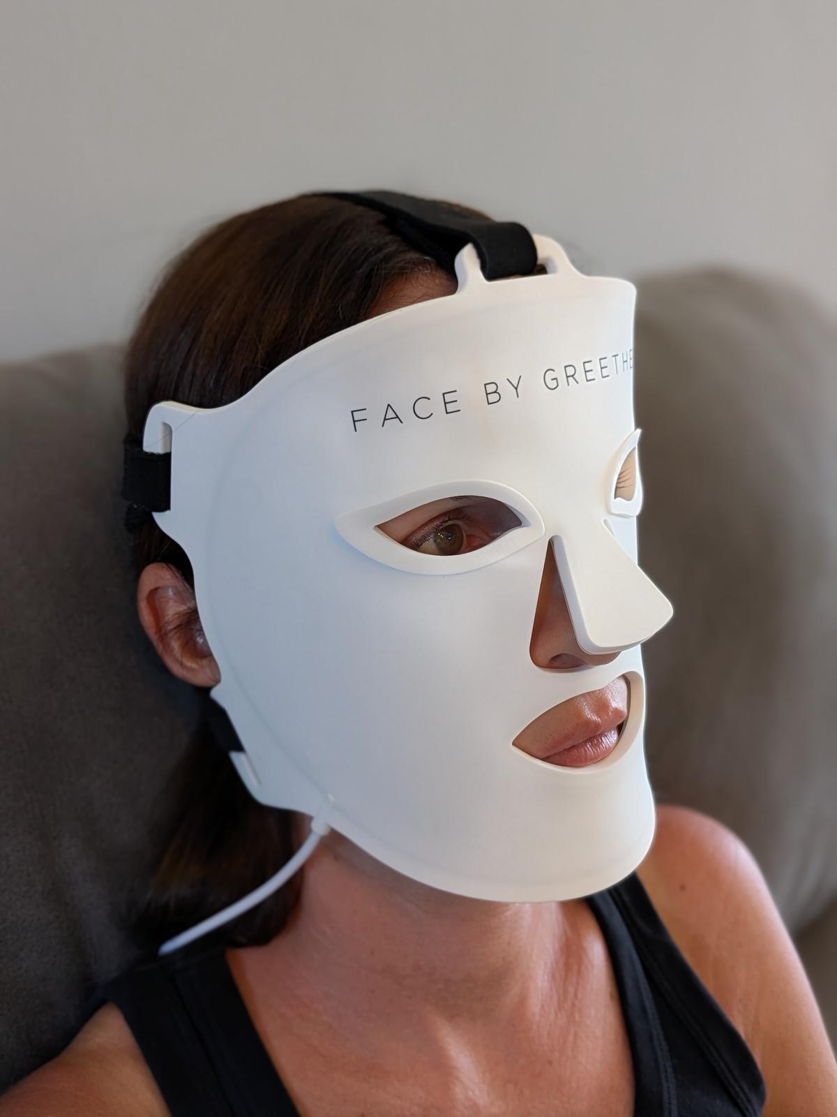 greethel wearing the led therapy face mask